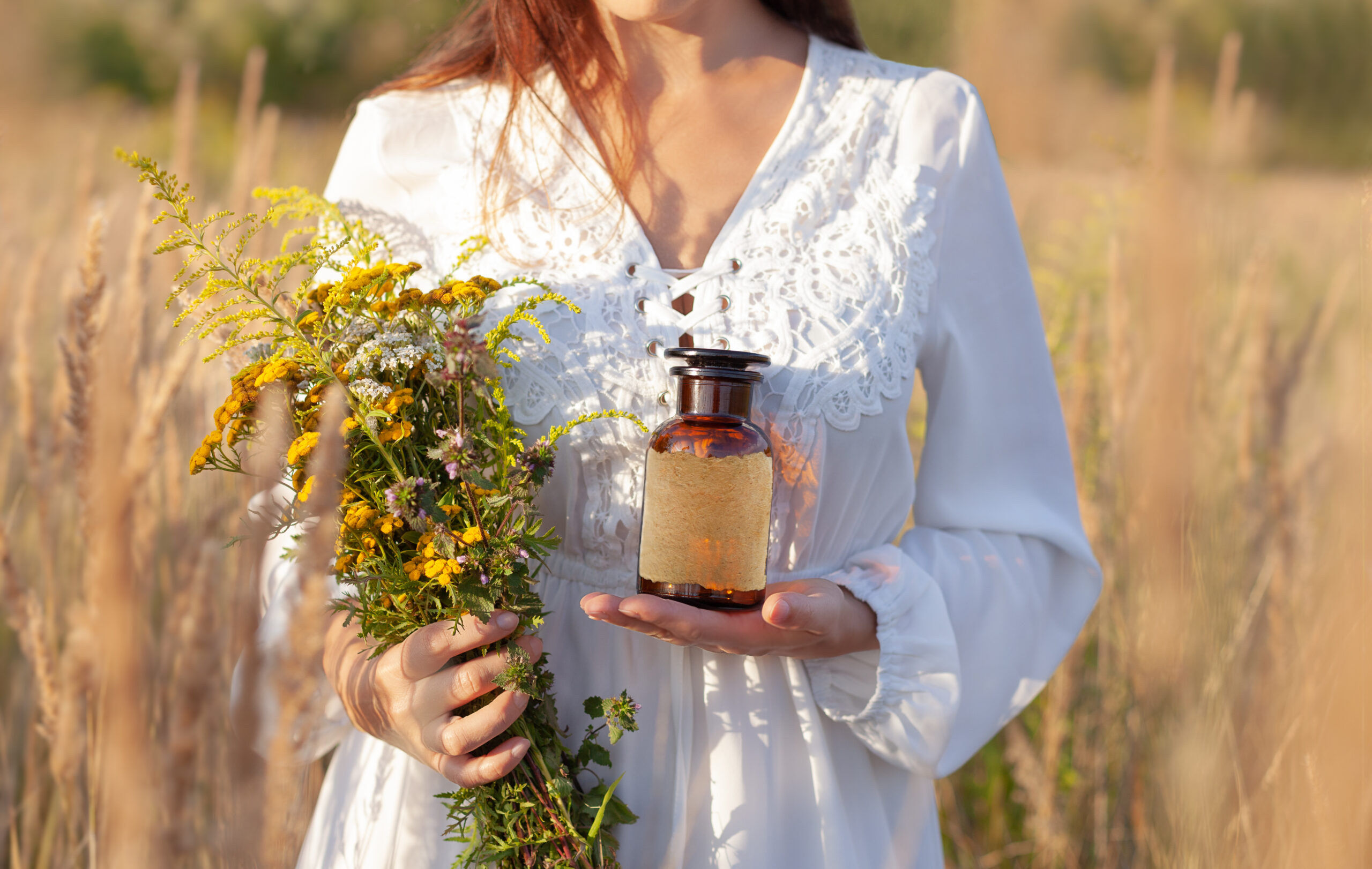 A,Woman,In,A,White,Dress,Is,Holding,A,Brown